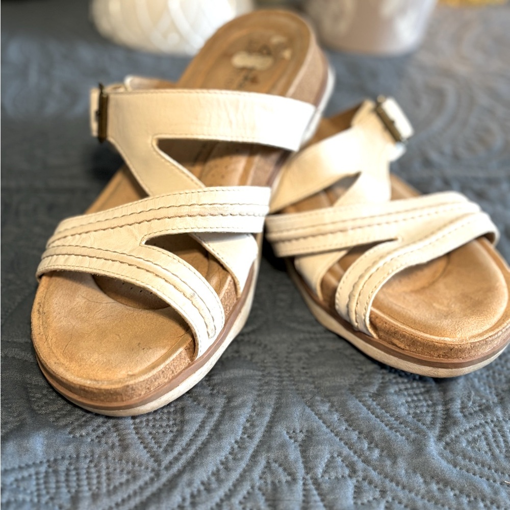 Clark’s white leather sandals